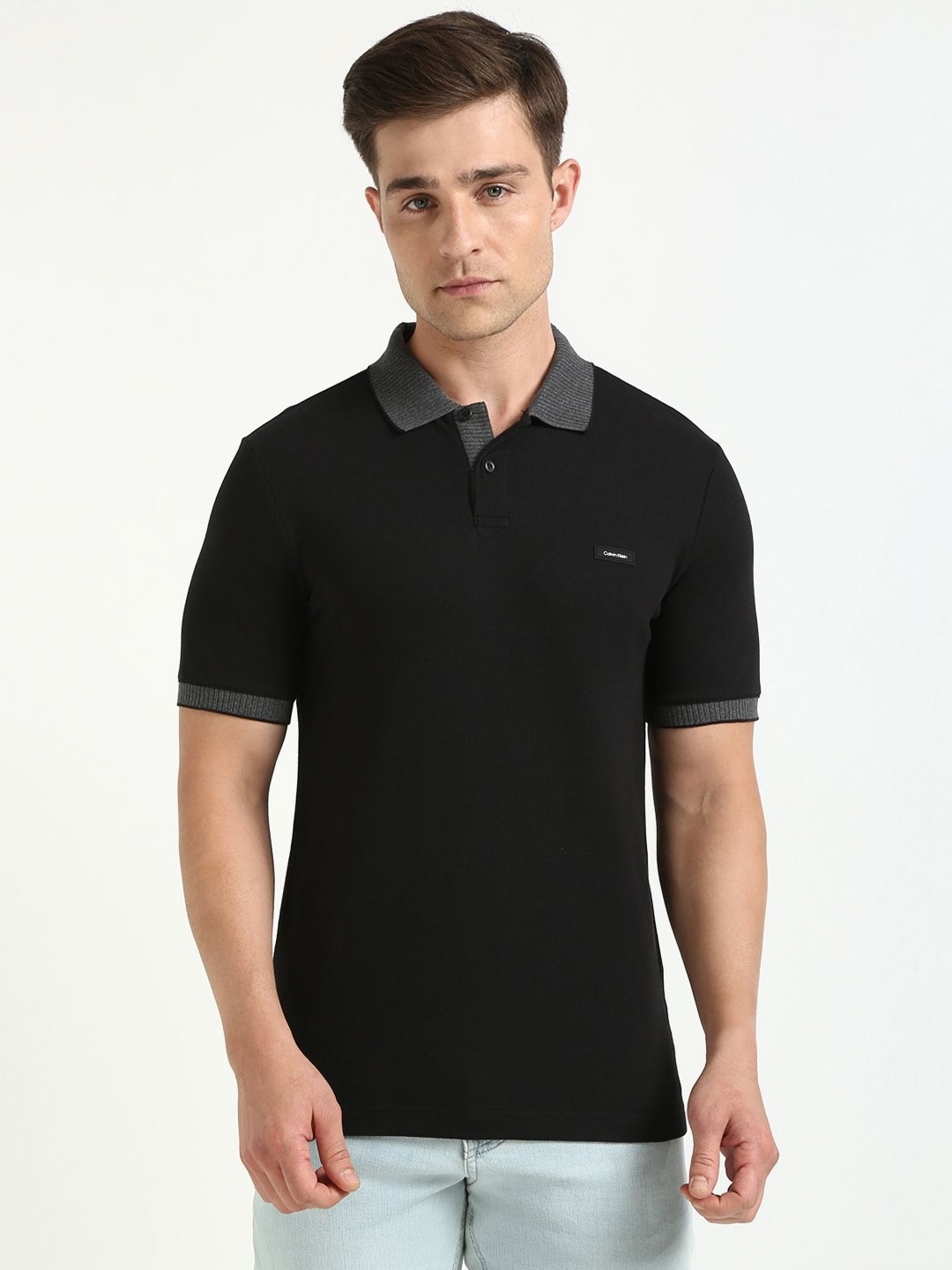 

Calvin Klein Jeans Men Solid Polo Collar Cotton Slim Fit T-shirt, Black