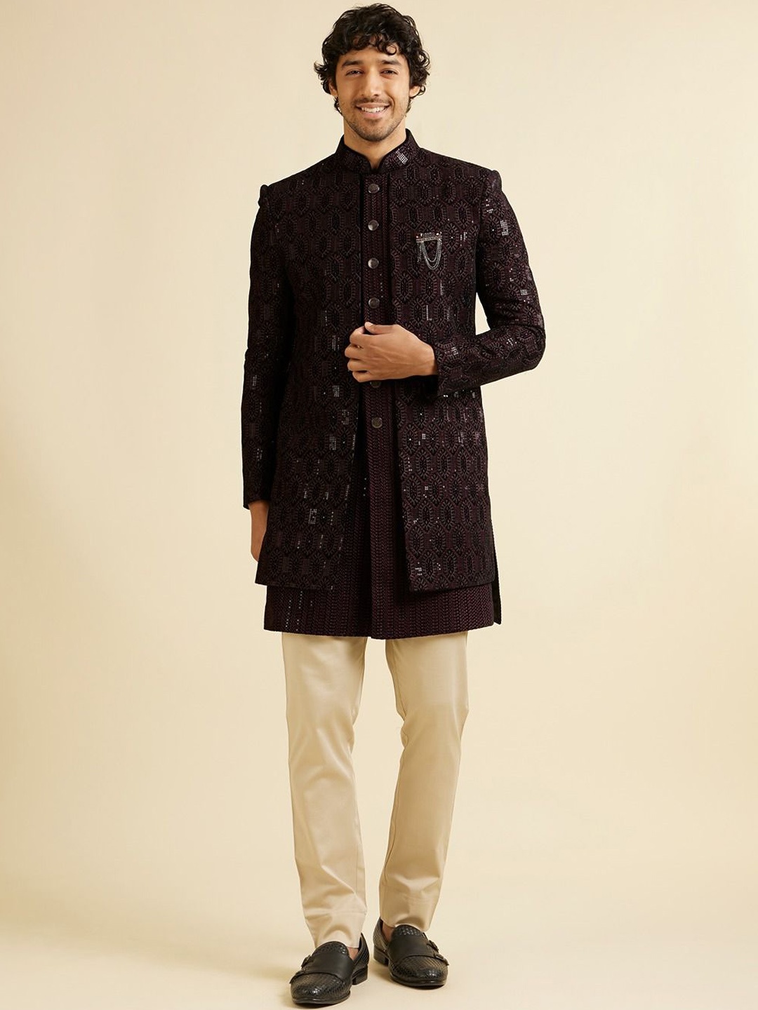 

Manyavar Men Embroidered Velvet Thread Work Mandarin Collar Sherwani Set, Purple
