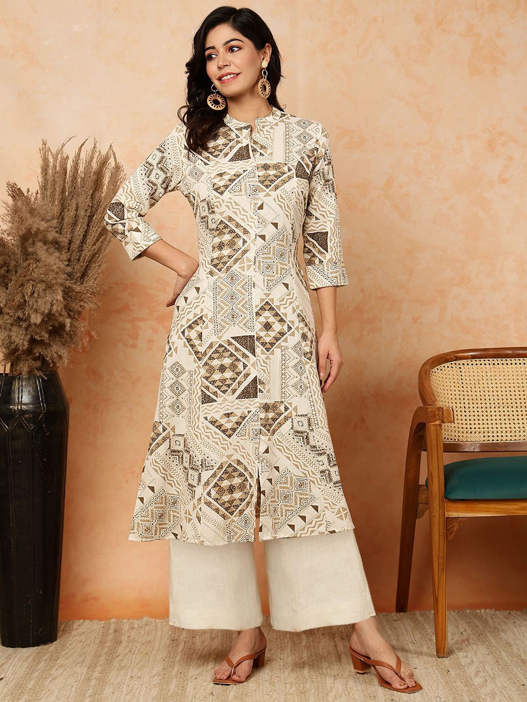 

GULMOHAR JAIPUR Women Floral Printed Flared Sleeves Thread Work Floral Kurta, Beige