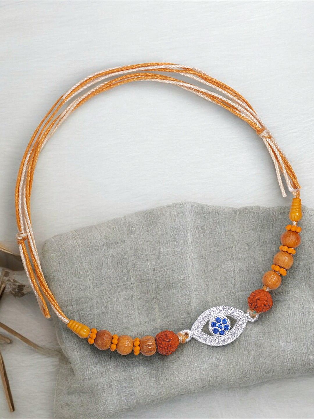 

Taraash Thread Rakhi, Silver