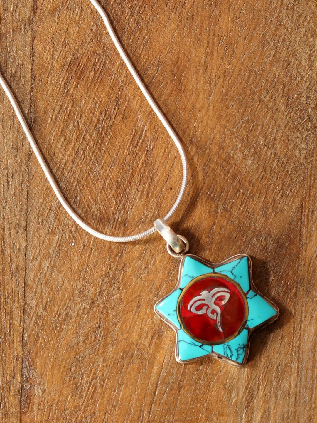 

Exotic India Swayambhunath Eye Inlay Sterling Silver Pendant
