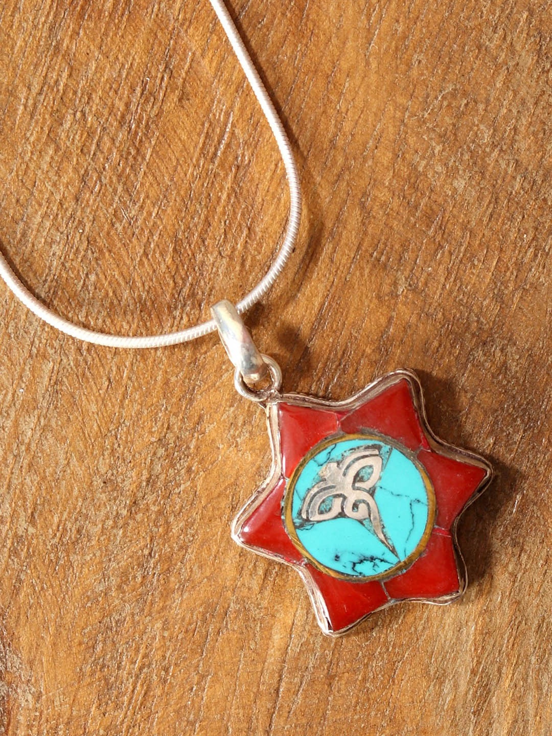 

Exotic India Swayambhunath Eye Inlay Sterling Silver Pendant