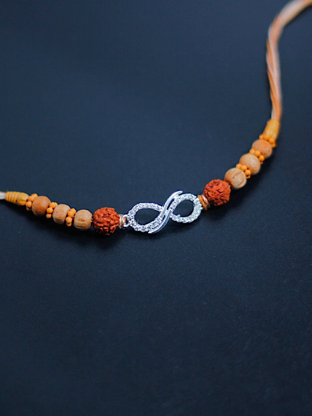 

Taraash Thread Rakhi, Silver