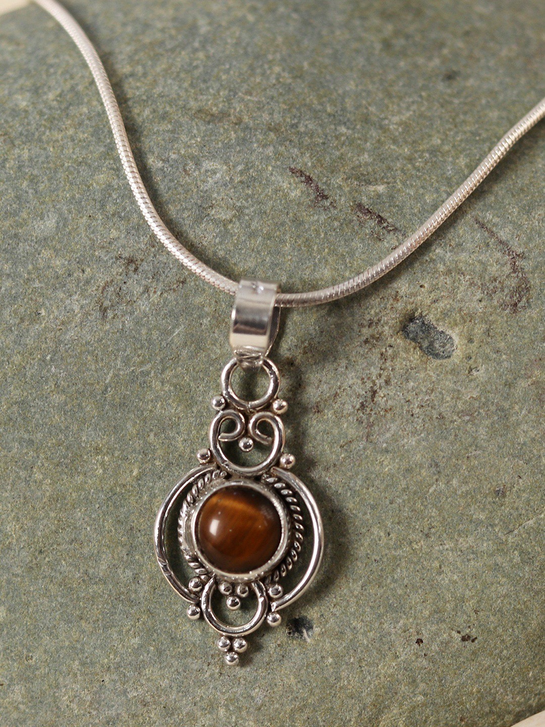 

Exotic India Tiger Eye Stone Patterned Designer Sterling Silver Pendant