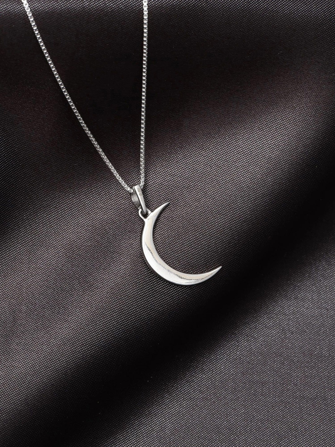 

Exotic India Silver-Plated Contemporary Pendants with Chains