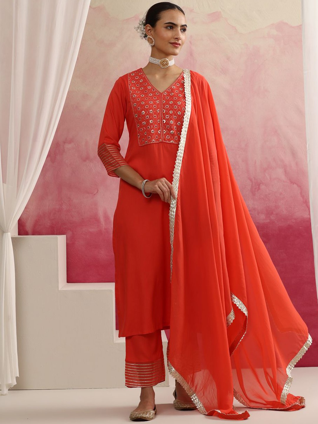 

Khushal K Floral Yoke Design Thread Work V-Neck Kurta With Palazzos & Dupatta, Orange