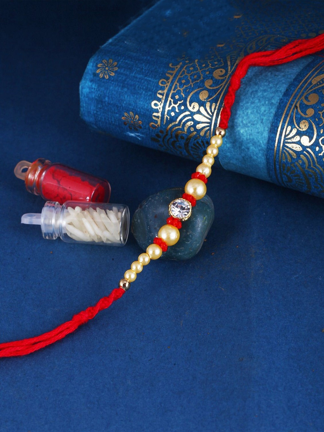 

Vighnaharta Thread Rakhi, Red