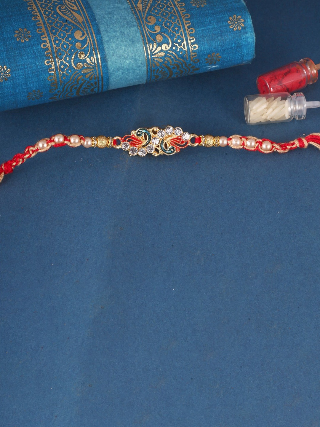 

Vighnaharta Thread Rakhi, Red