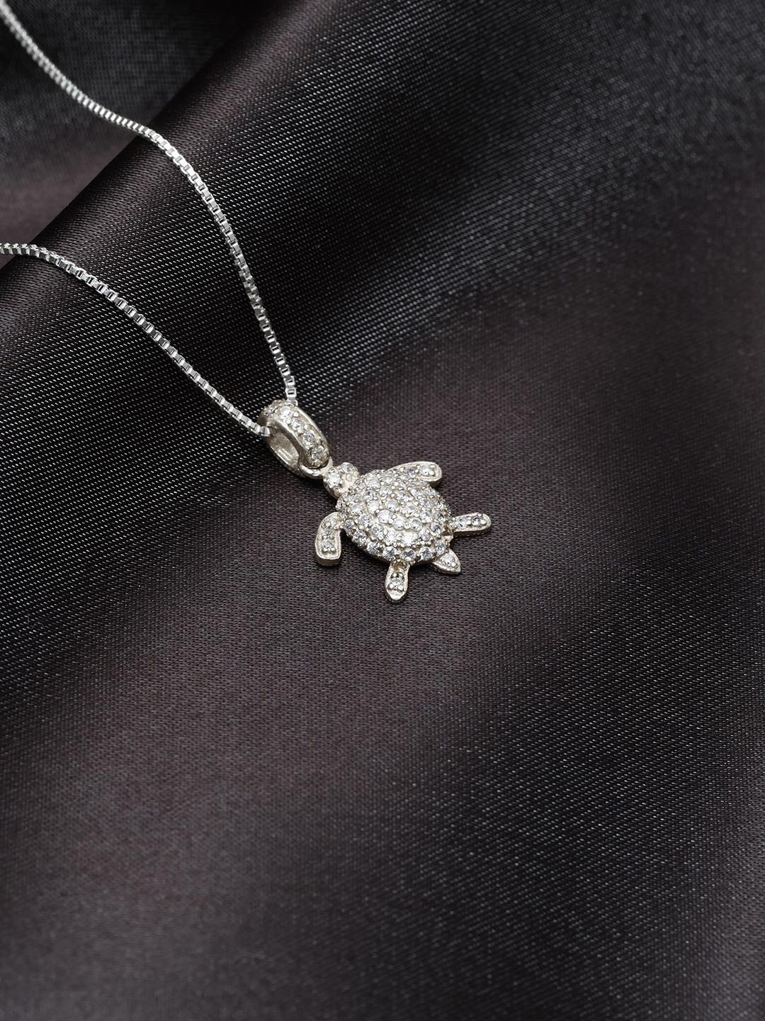 

Exotic India Silver-Plated Contemporary Pendants with Chains