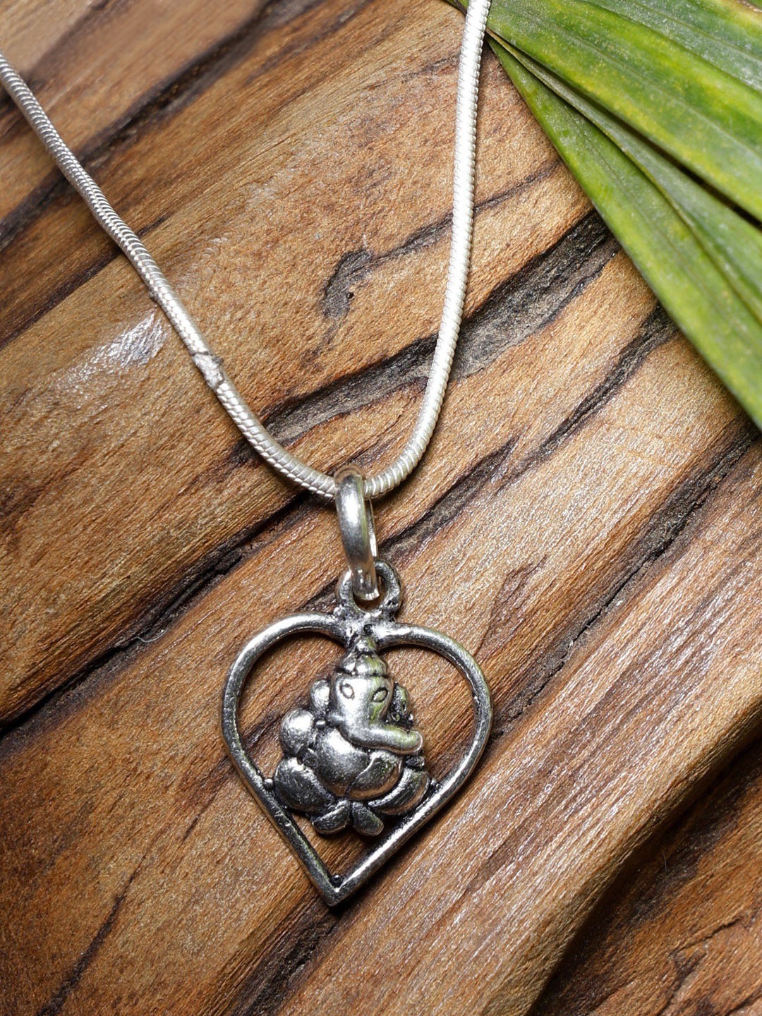 

Exotic India Small Lord Ganesha Sterling Silver Pendant