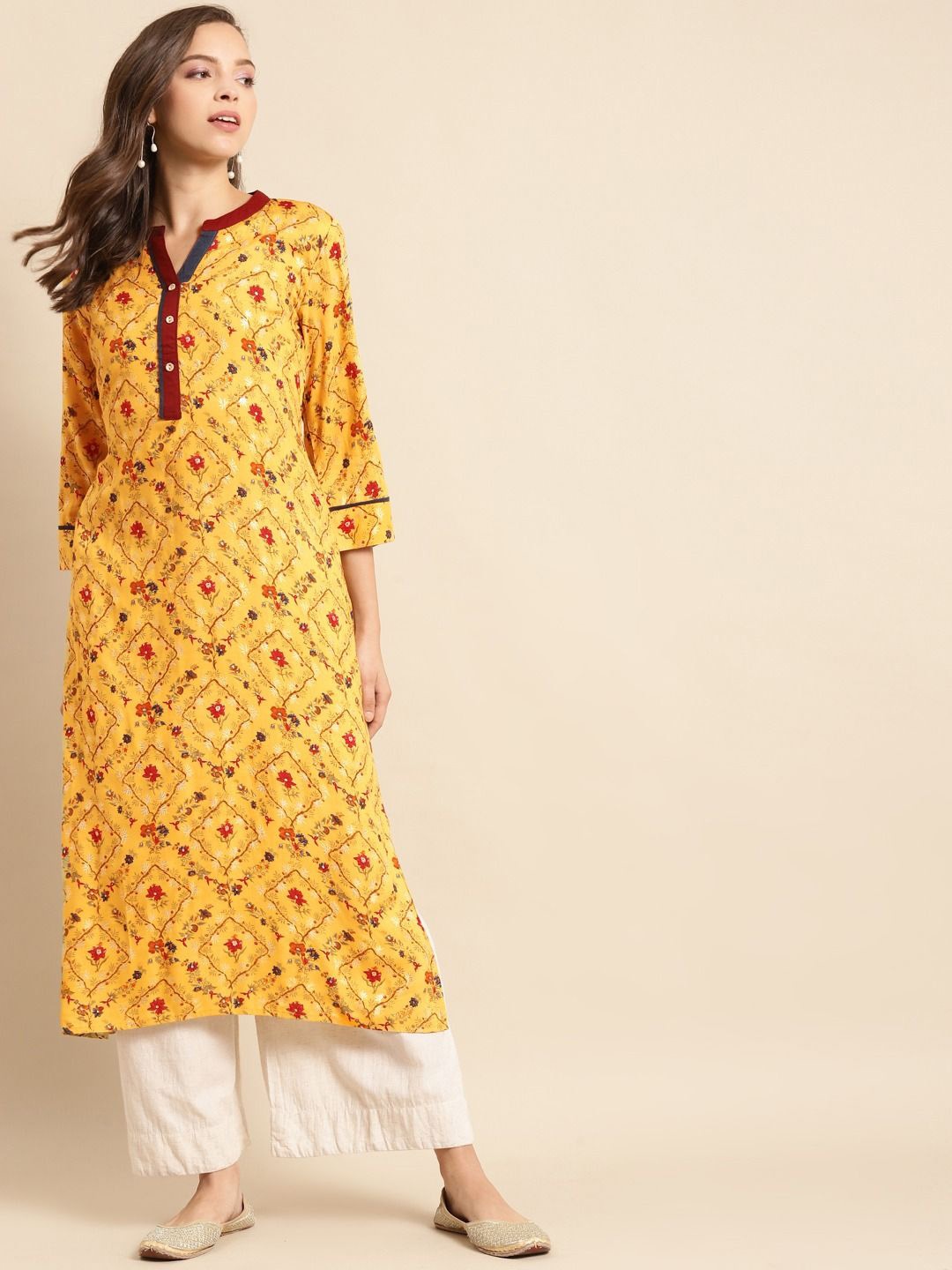 

Anouk Women Embroidered Flared Sleeves Gotta Patti Liva Pathani Kurta, Yellow
