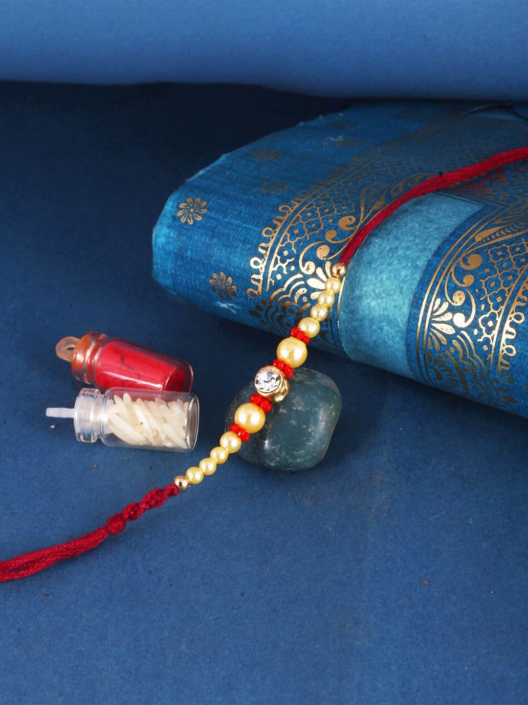 

Vighnaharta Thread Rakhi, Red