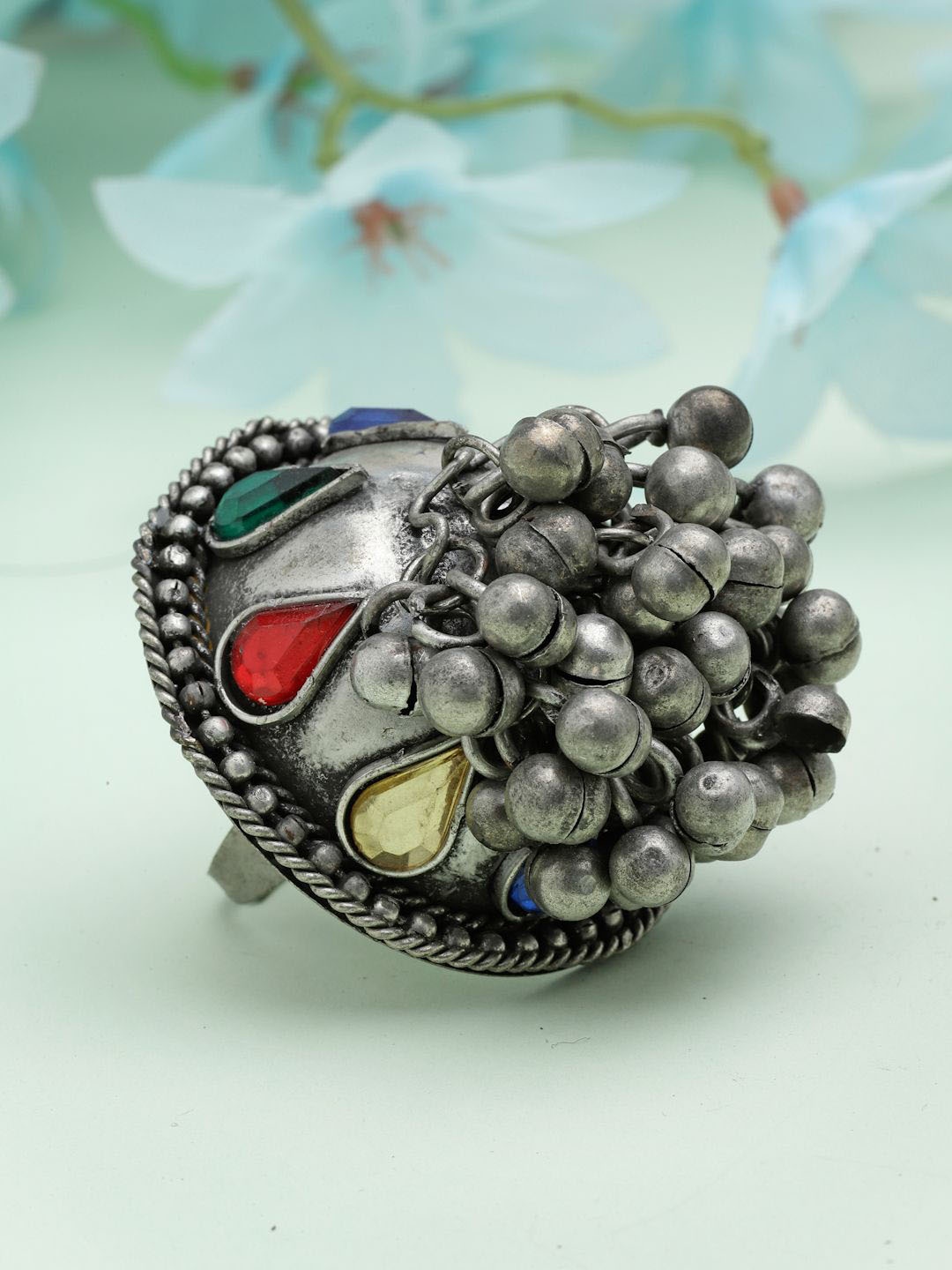 

Moedbuille Silver Plated Moedbuille Stones & Ghungroo Studded Finger Ring