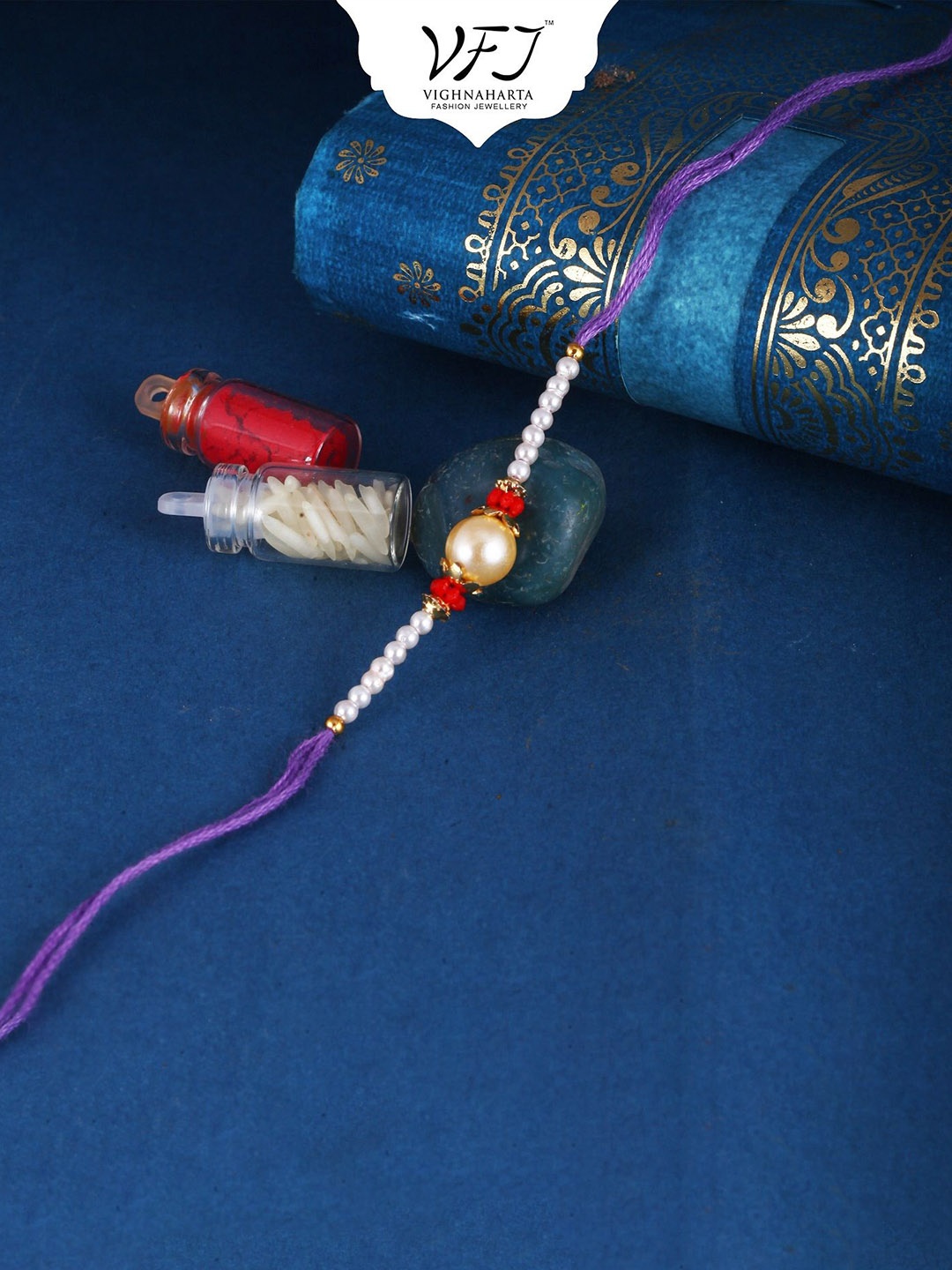 

Vighnaharta Thread Rakhi, Purple