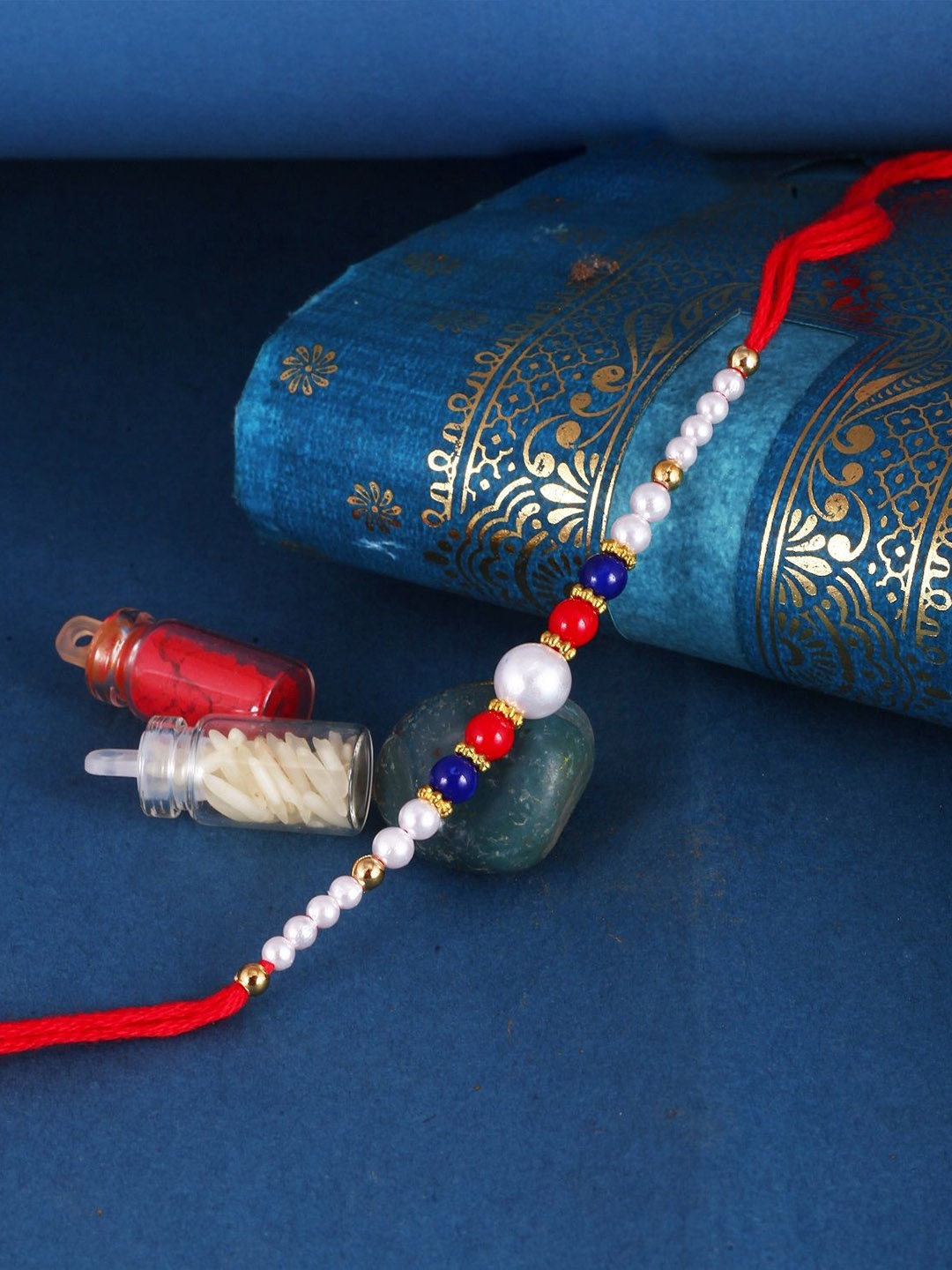 

Vighnaharta Thread Rakhi, Red