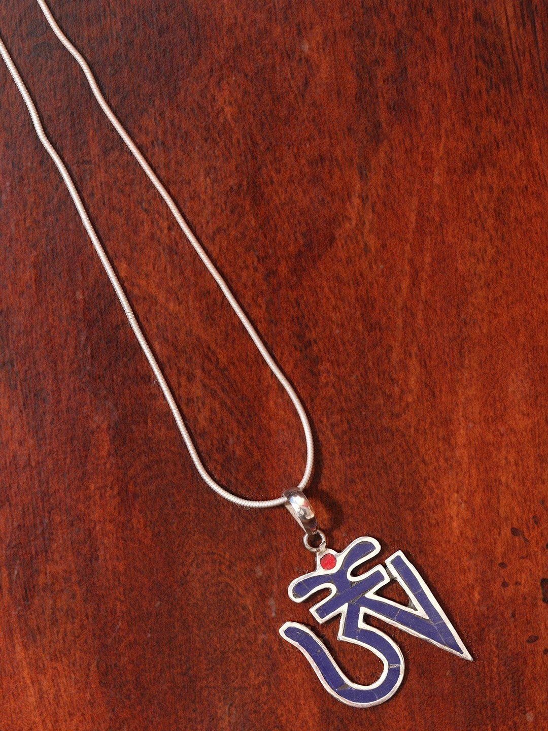 

Exotic India Blue Tibetan Om (AUM) Inlay Sterling Silver Pendant