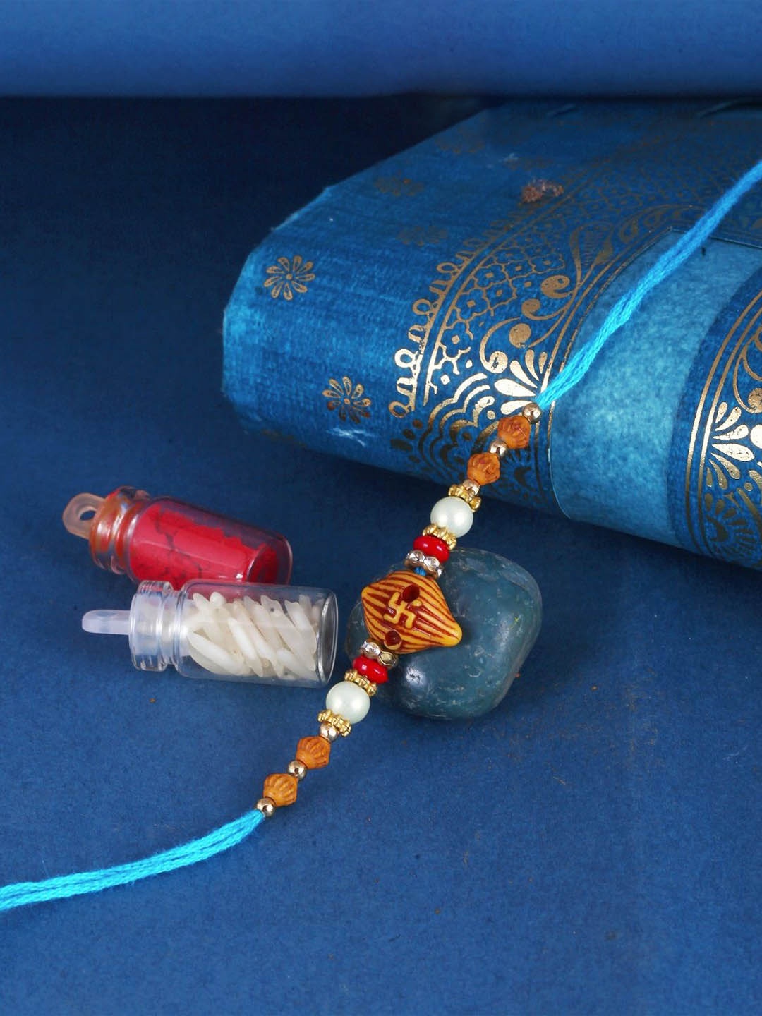 

Vighnaharta Thread Rakhi, Blue