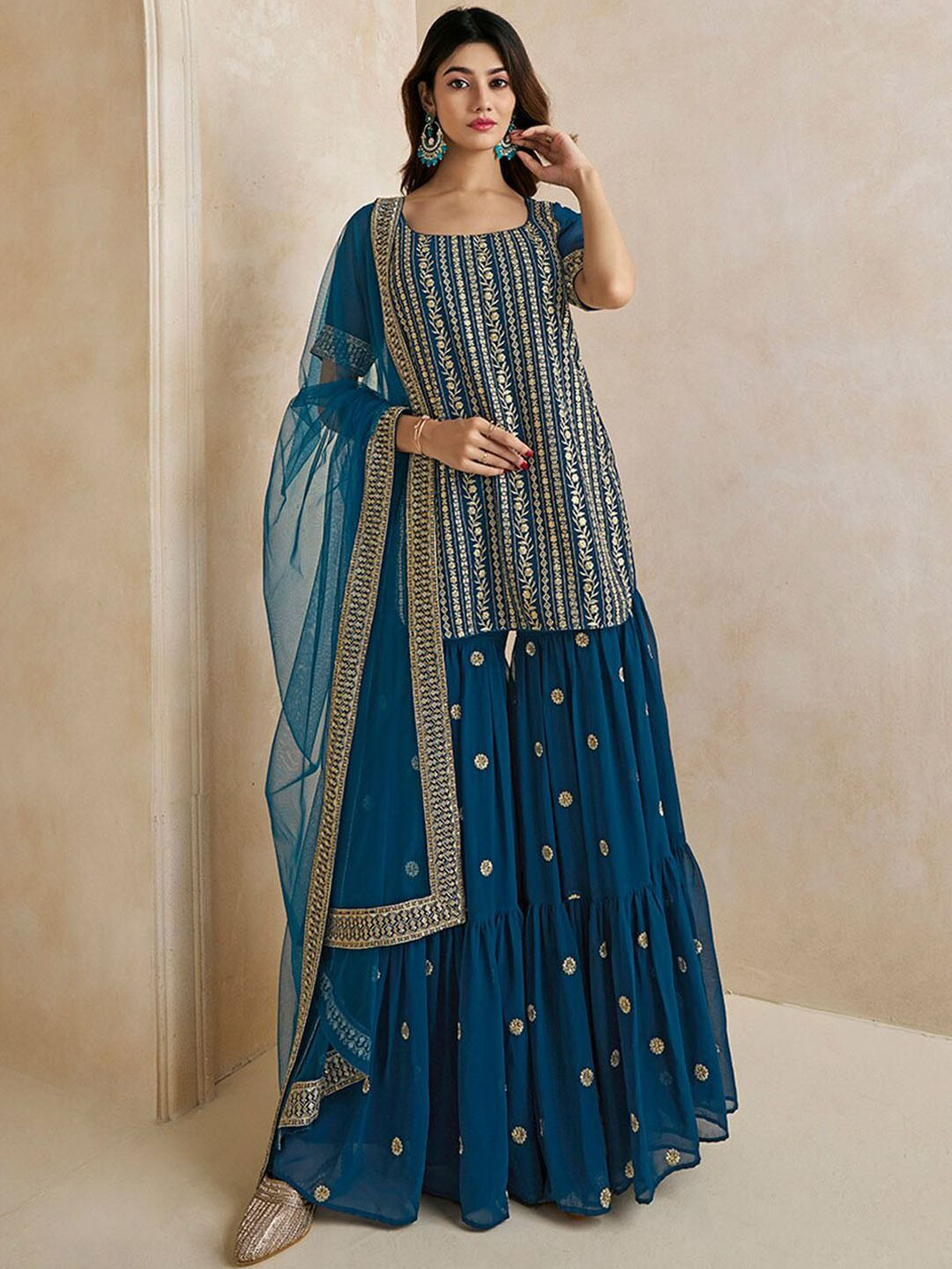 

Ethnic Yard Women Ethnic Motifs Embroidered Regular Thread Work Kurta with Sharara & With Dupatta, Turquoise blue