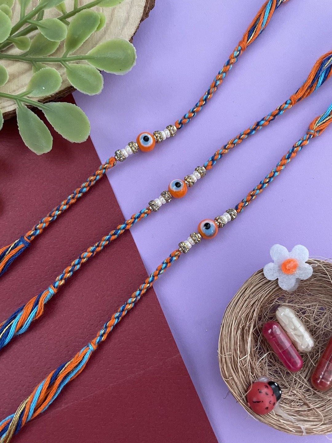 

Digital Dress Room Multistrand Rakhi, Orange
