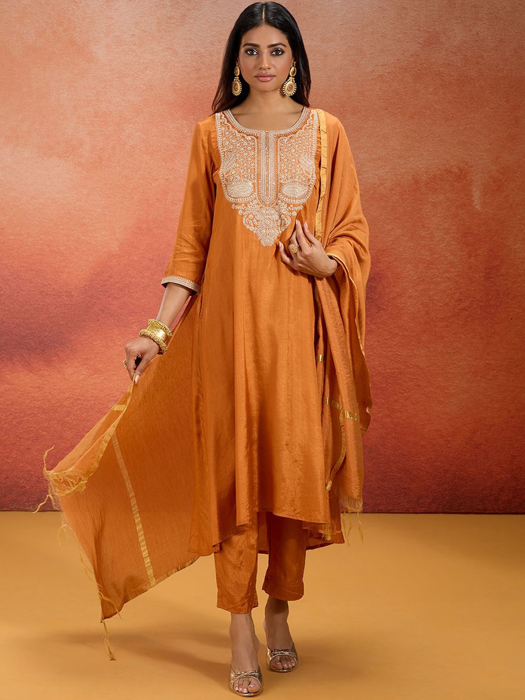 

Likha Women Ethnic Motifs Yoke Design Regular Thread Work Kurta with Pyjamas & With Dupatta, Orange