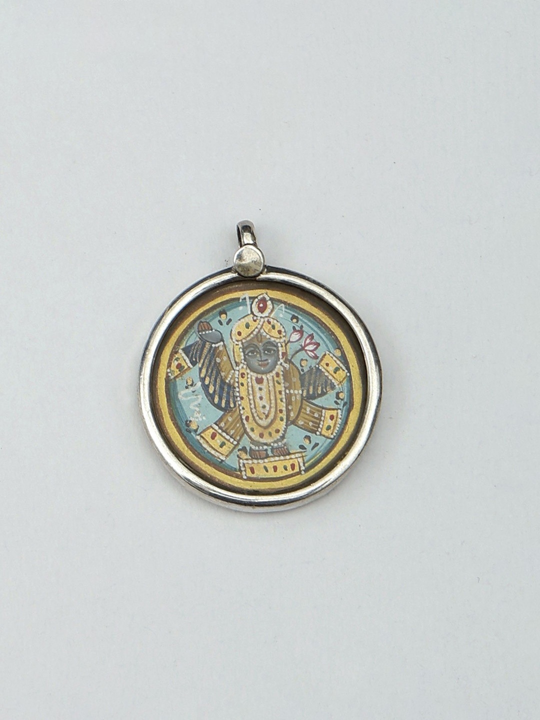 

Exotic India Silver-Plated Circular Pendants