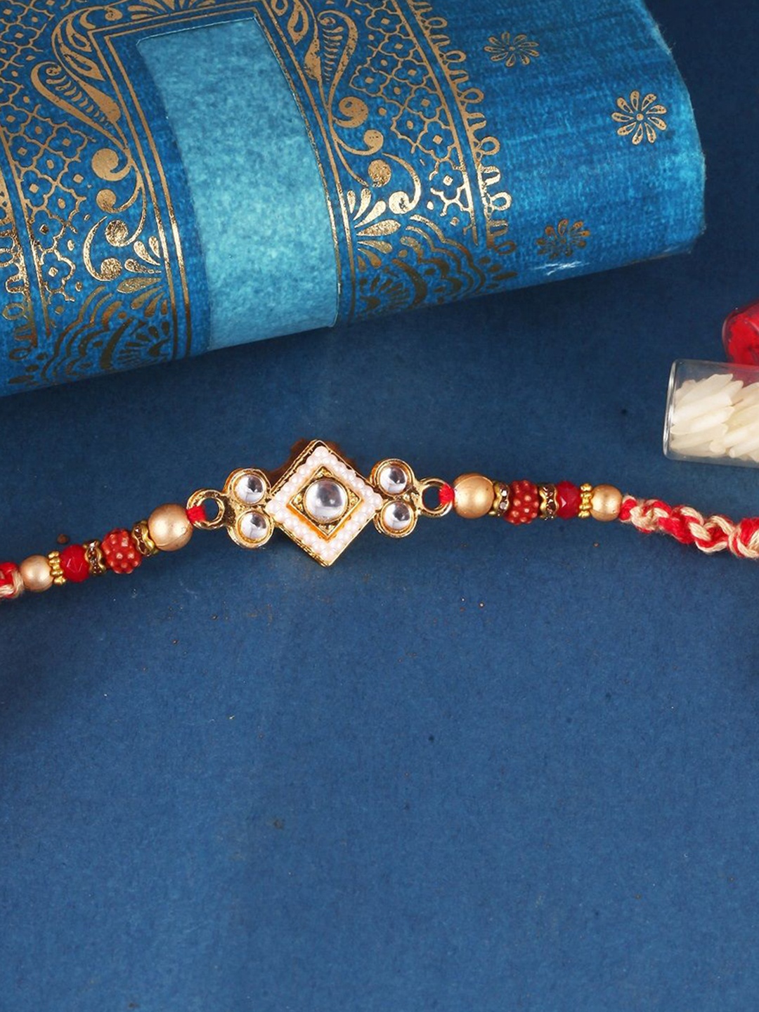 

Vighnaharta Thread Rakhi, Red