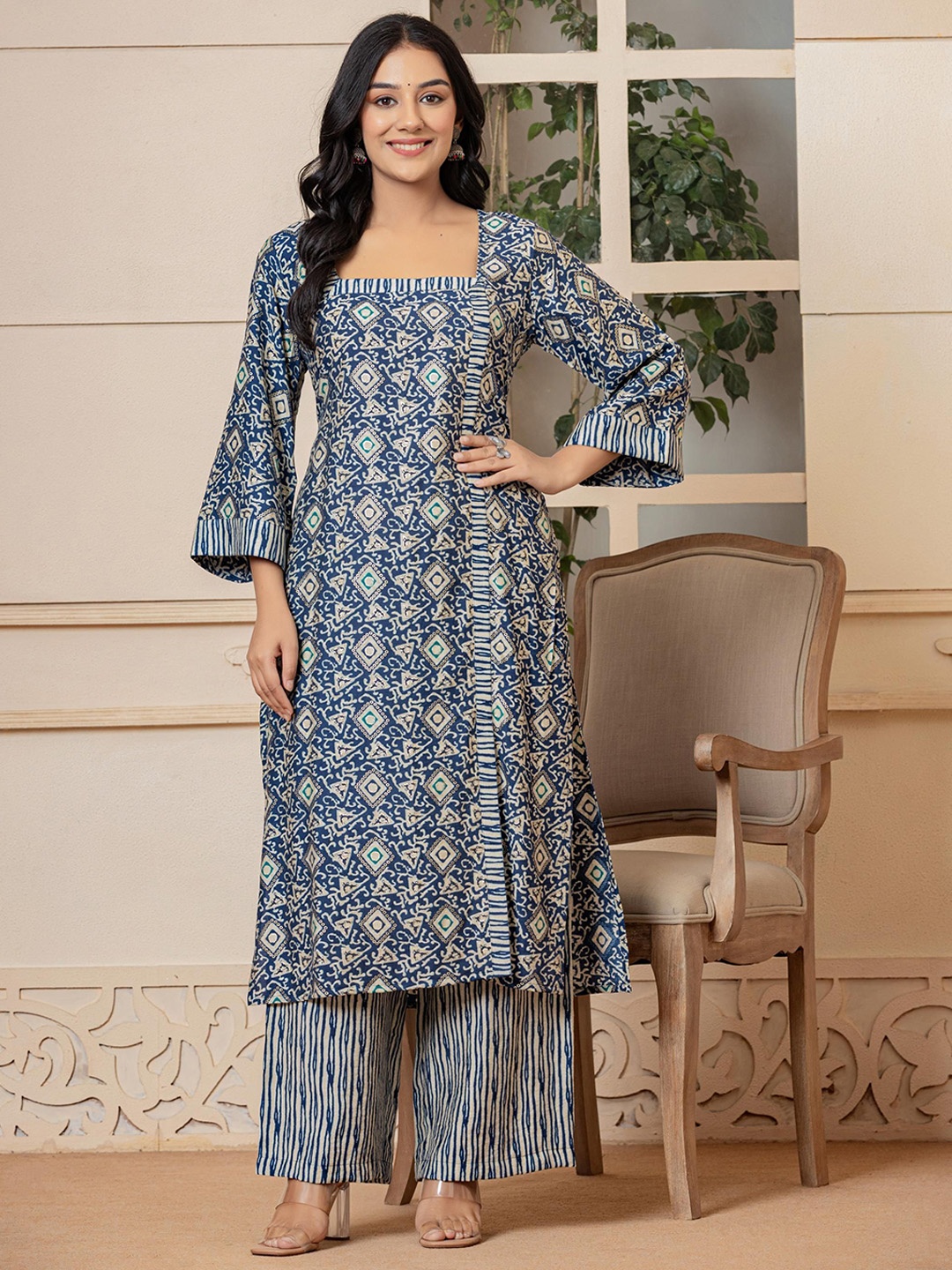 

Rouhab Twilight Muslin Geometric Printed Flared Sleeves Straight Kurta with Palazzos, Blue