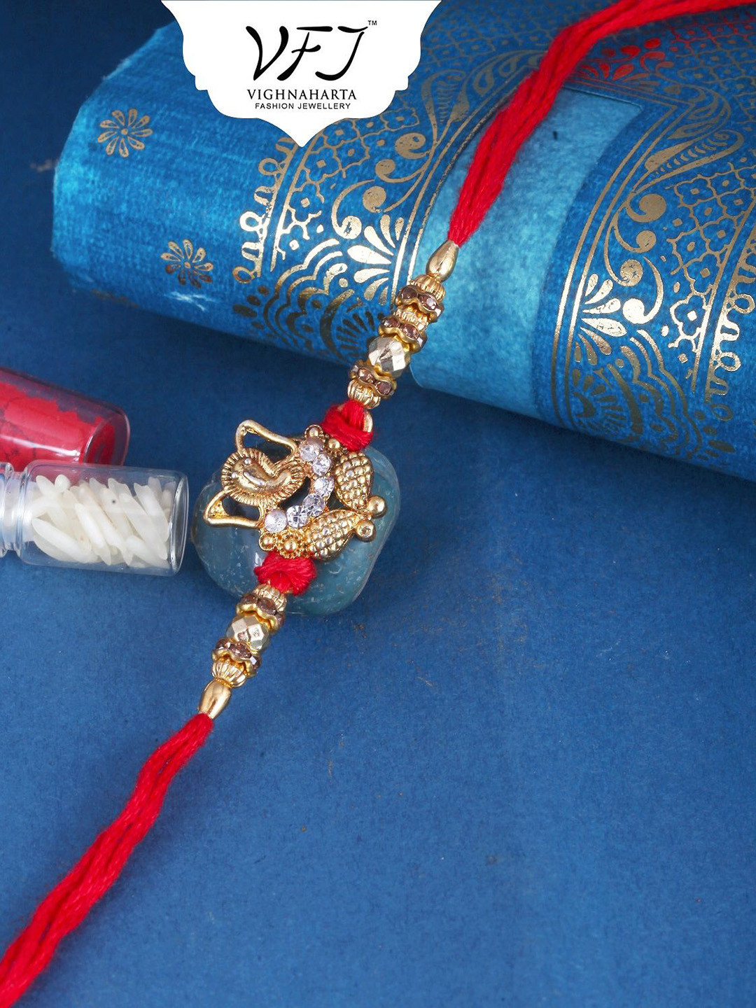 

Vighnaharta Thread Rakhi, Gold