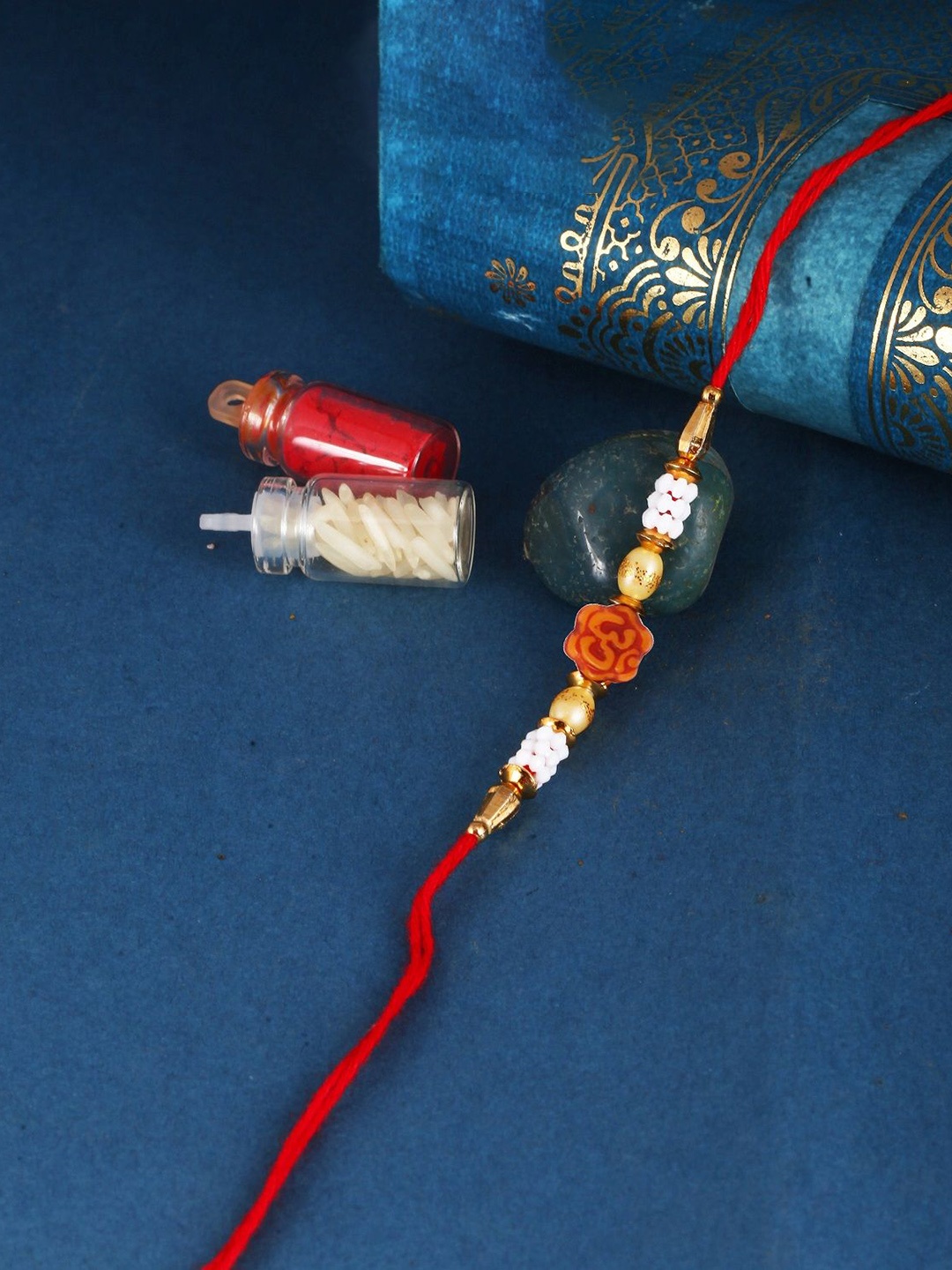 

Vighnaharta Thread Rakhi, Red