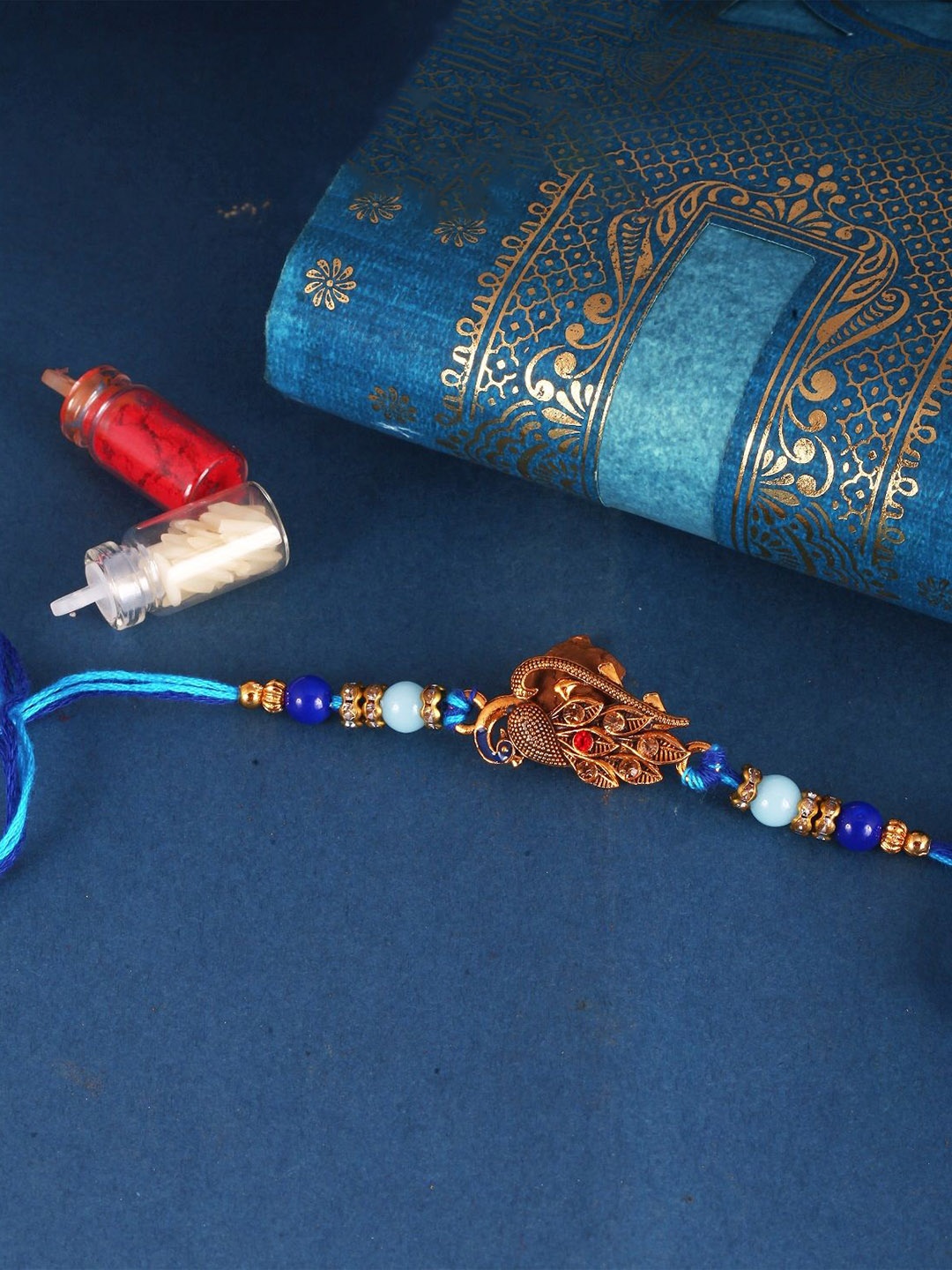 

Vighnaharta Thread Rakhi, Blue