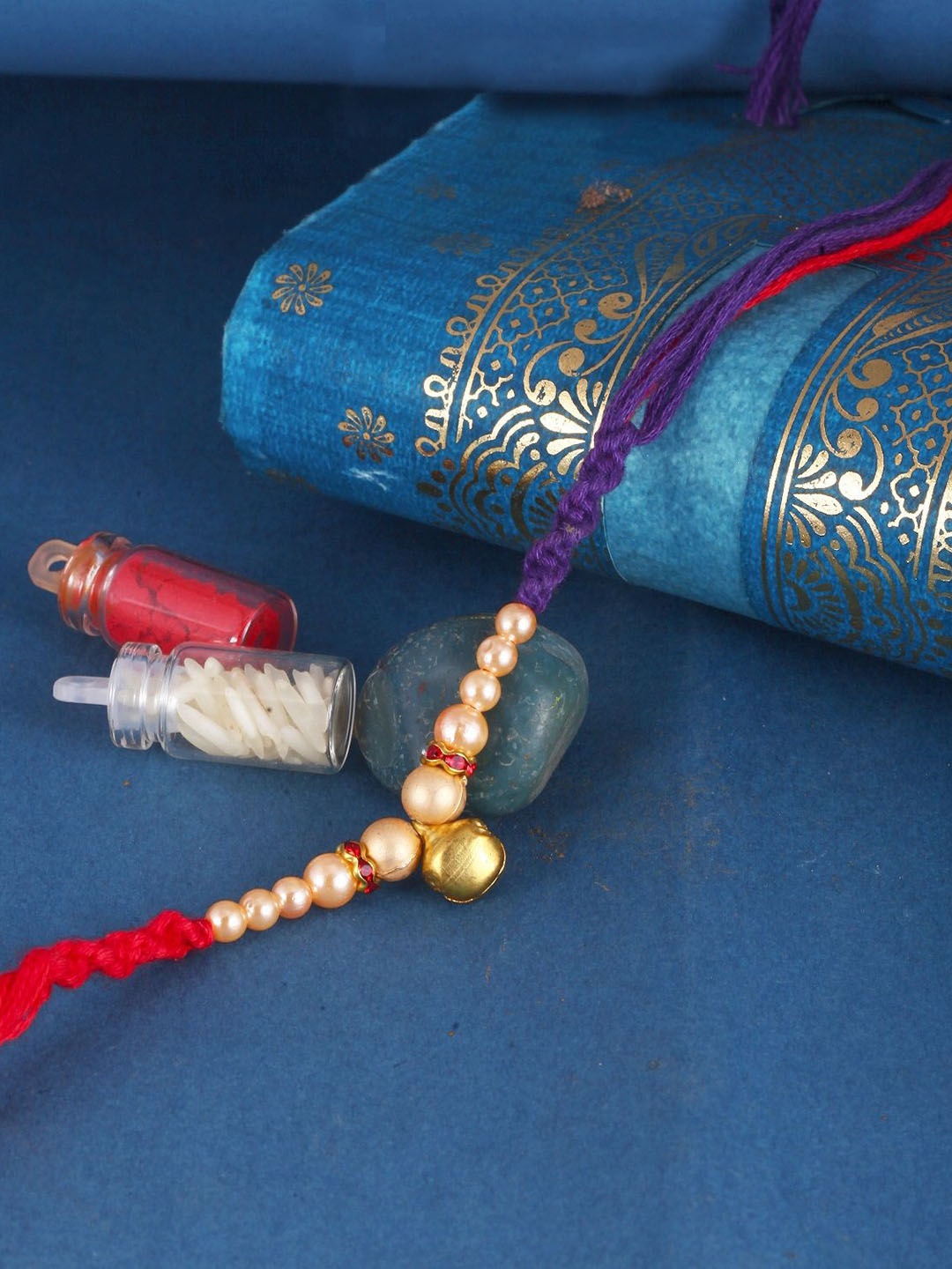 

Vighnaharta Thread Rakhi, Gold