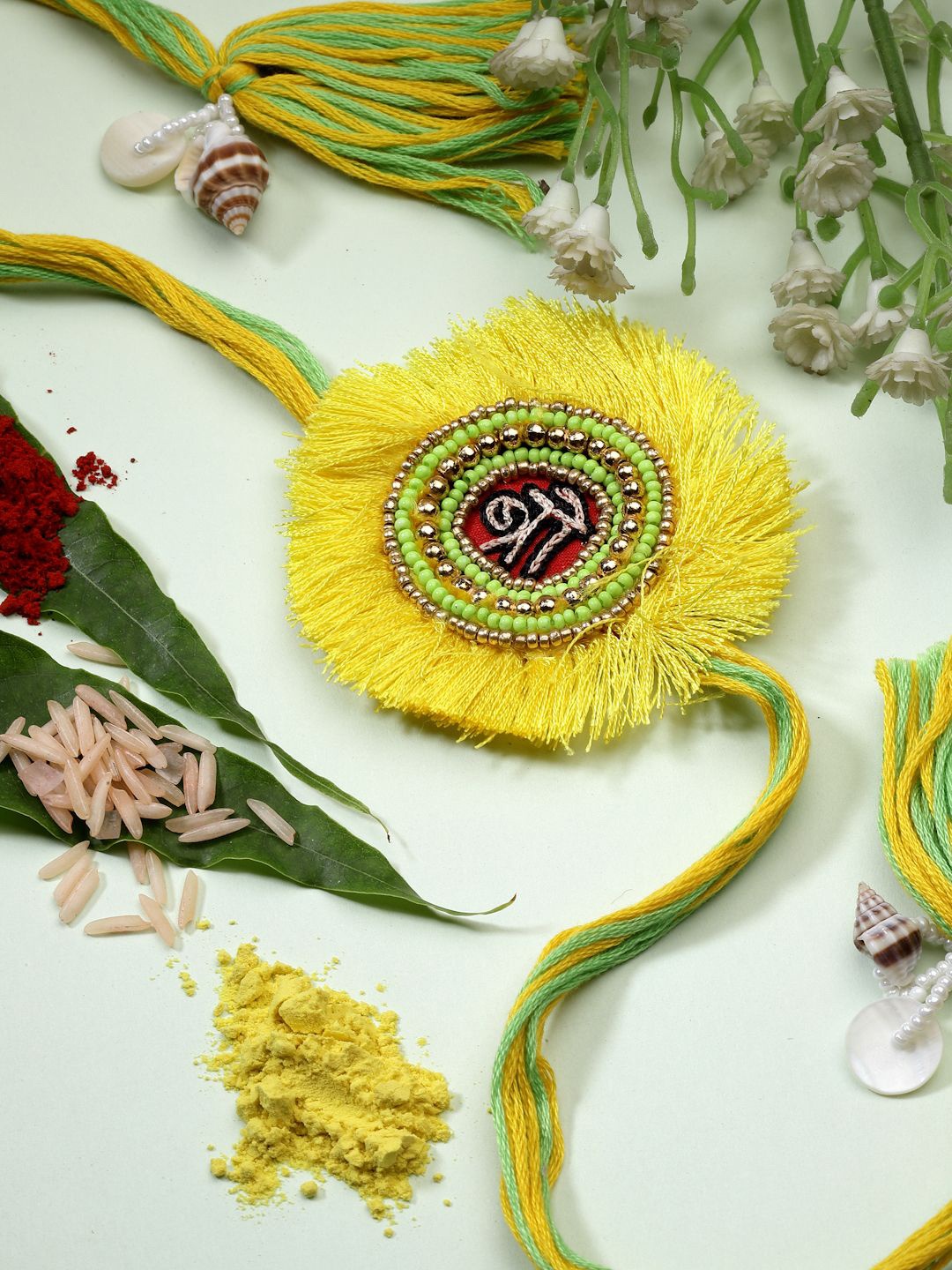 

Moedbuille Multistrand Rakhi, Yellow