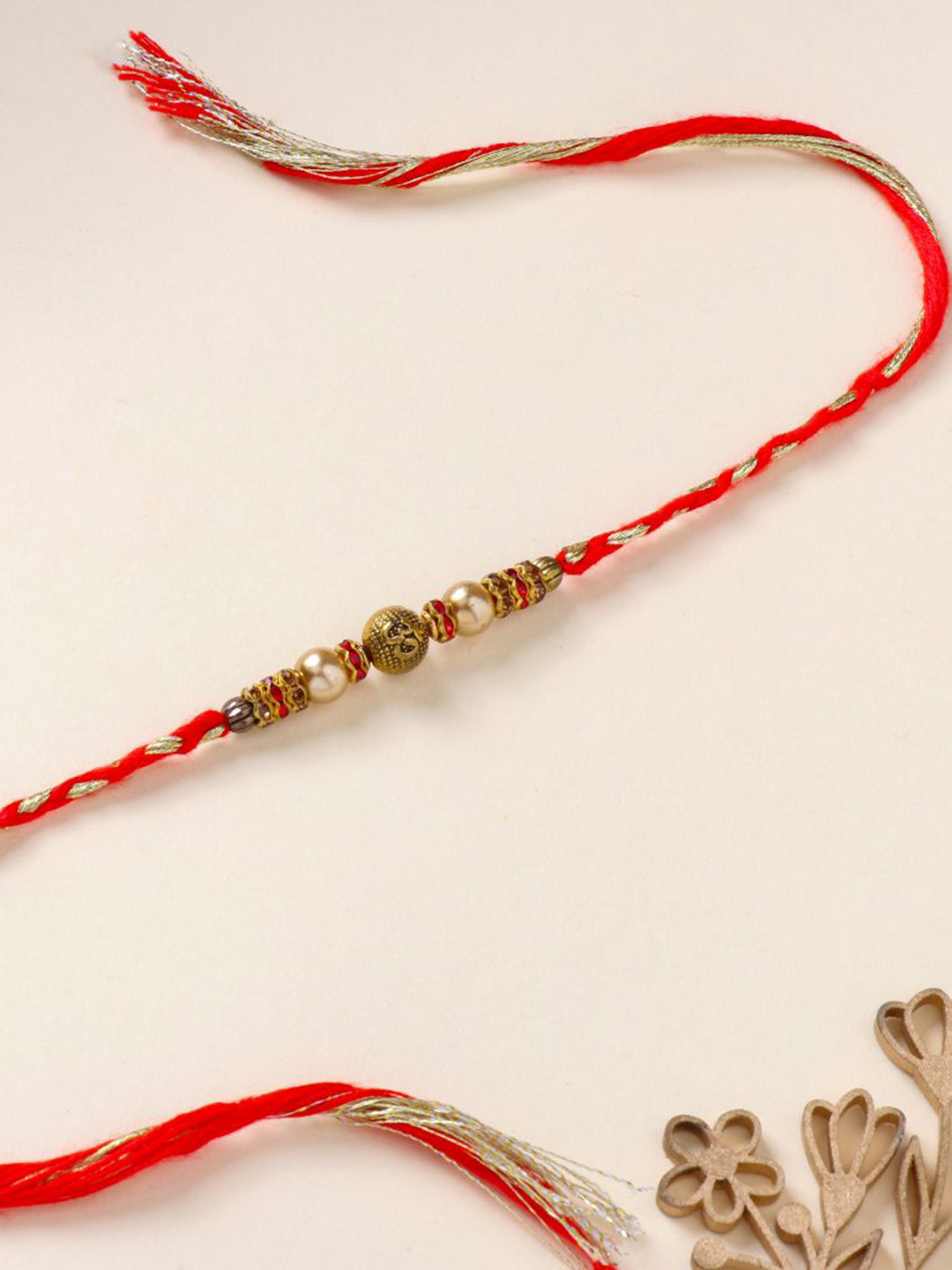 

Floweraura Embellished Om Beaded Thread Bracelet Rakhi with Roli Chawal, Gold