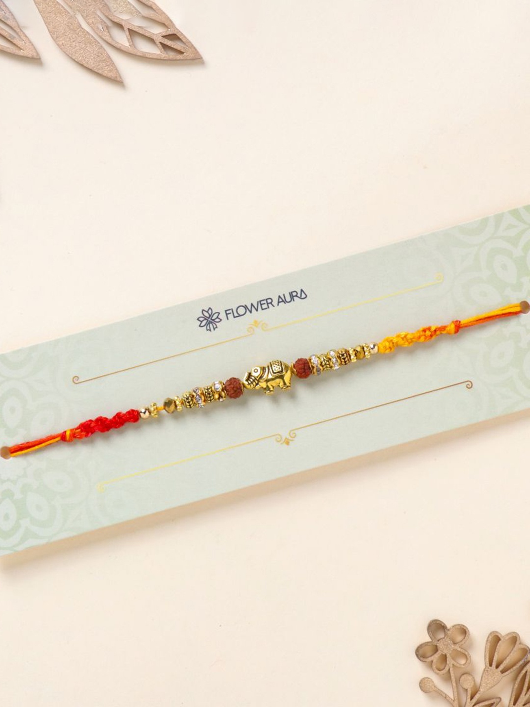 

Floweraura Elephant Rudraksha Thread Bracelet Rakhi with Roli Chawal, Gold