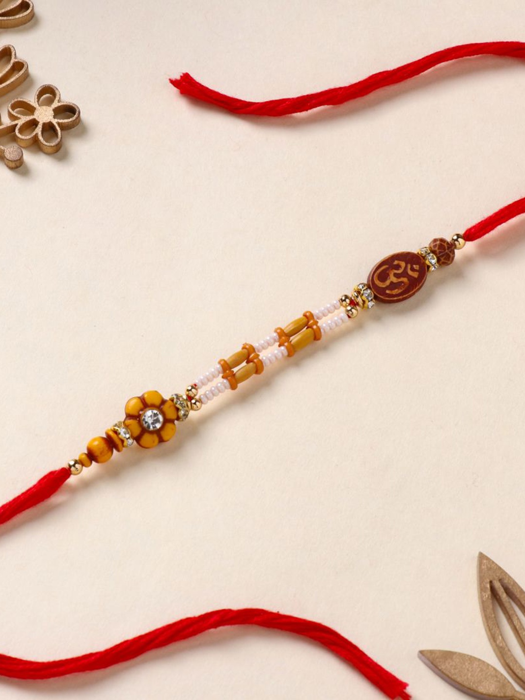 

Floweraura Om Flower Beaded Rakhi Bracelet With Roli Chawal, Black