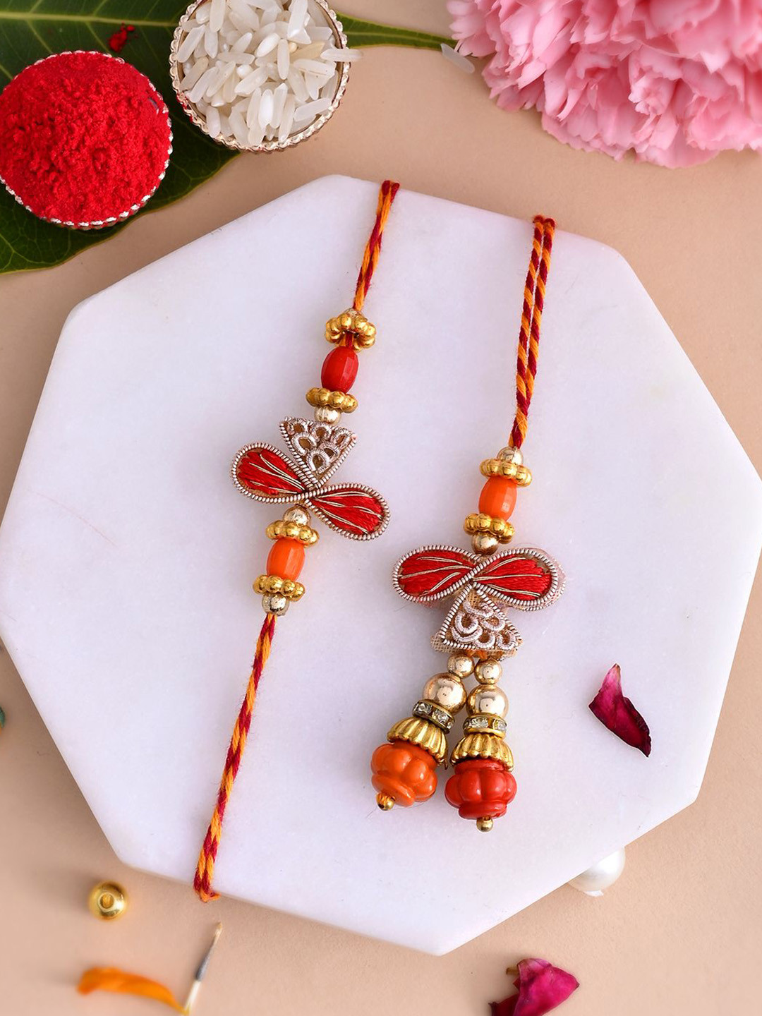 

Anouk Red Beaded Bhaiya Bhabhi Thread Rakhis With Roli Chawal