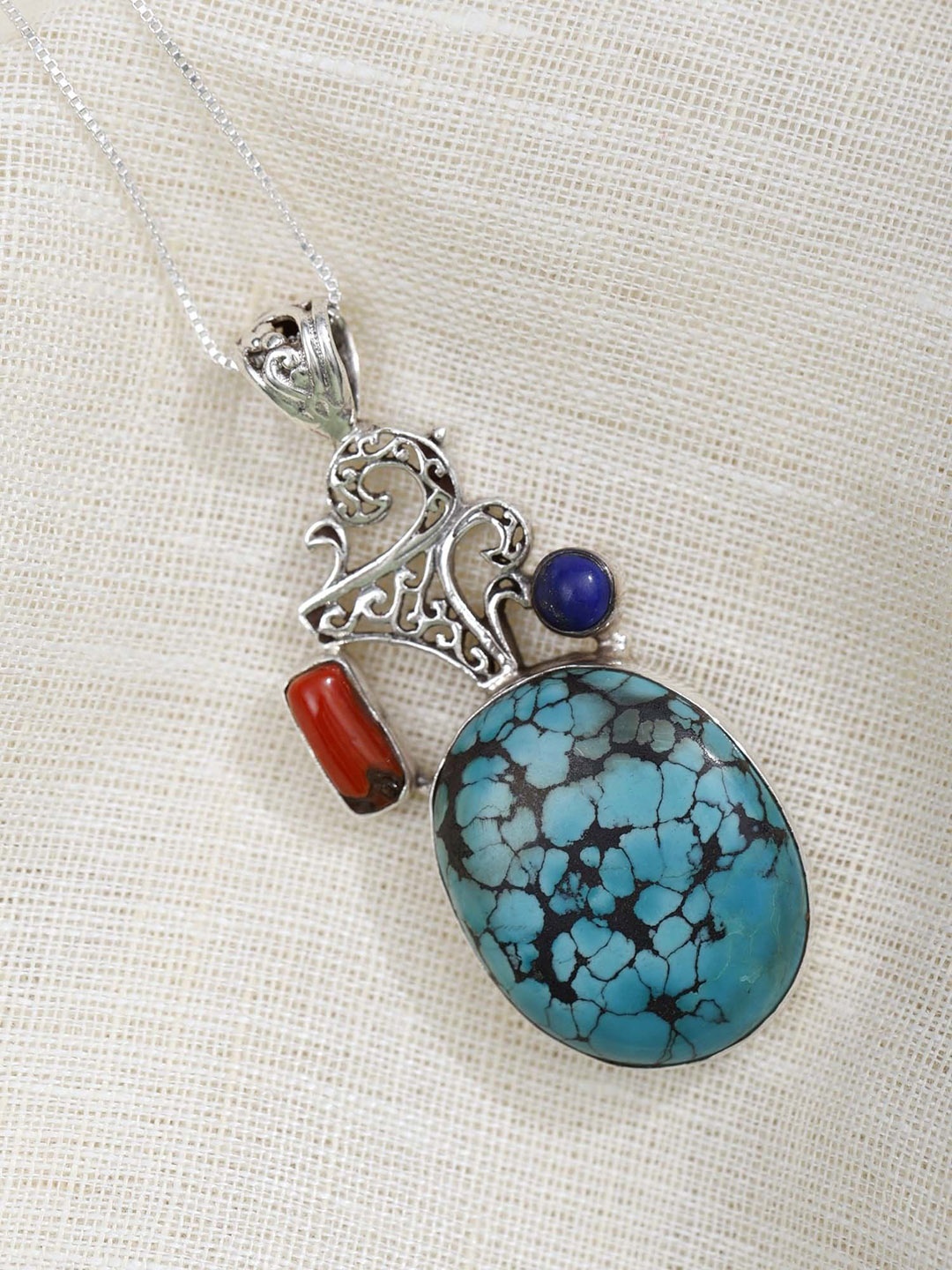 

Exotic India Turquoise with Coral and Lapis Lazuli Gemstone Sterling Silver Pendant