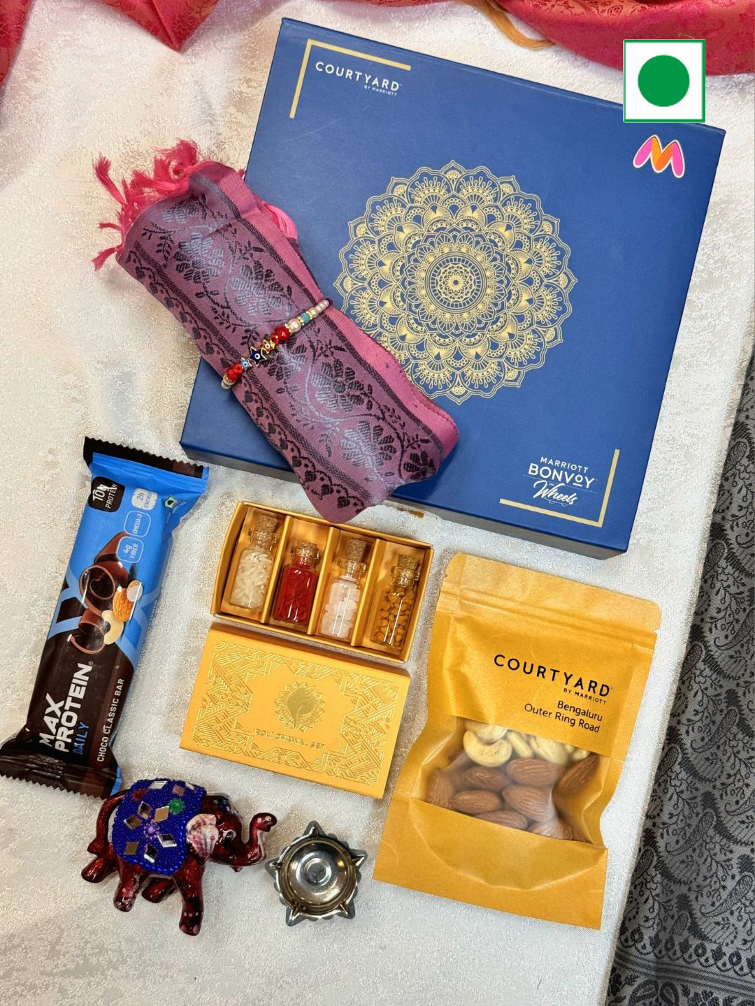 

fnp 1 Rakhi with 6 Assorted Gifts, Multi