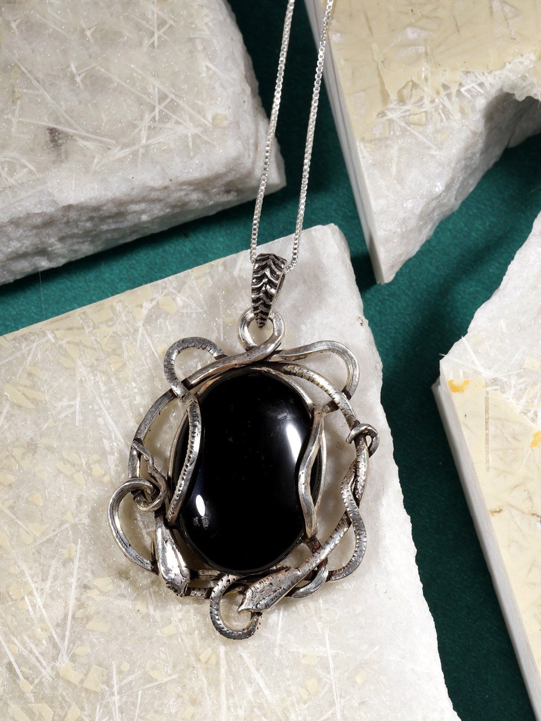 

Exotic India Black Onyx Snake Wrapped Sterling Silver Pendant