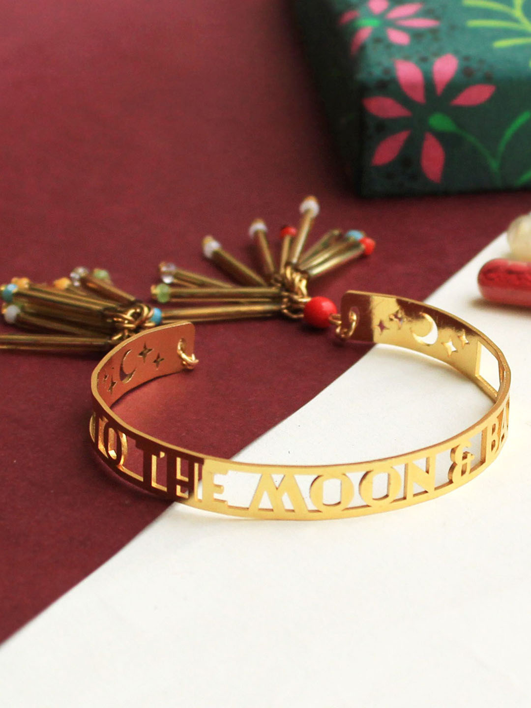 

BeAbhika To The Moon And Back Golden Glass Tubes Bhabhi Lumba Band Rakhi, Gold