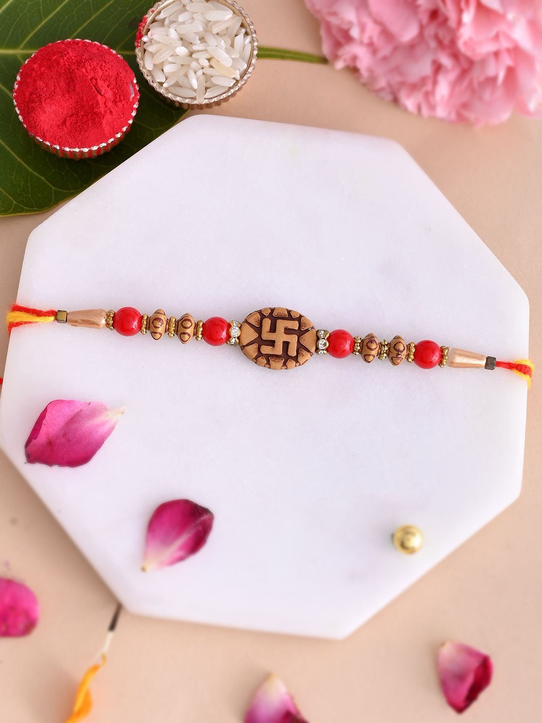 

Anouk Divine Swastik Beaded Thread Rakhi With Roli Chawal & Greetings Card, Brown