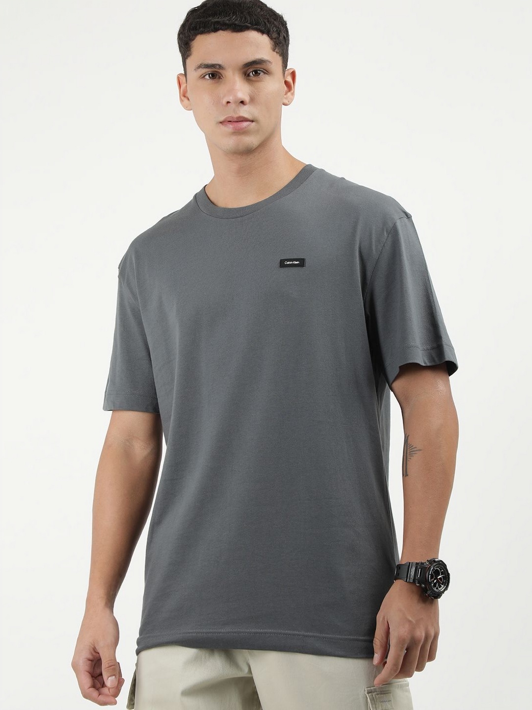 

Calvin Klein Jeans Men Solid Round Neck Cotton T-shirt, Grey