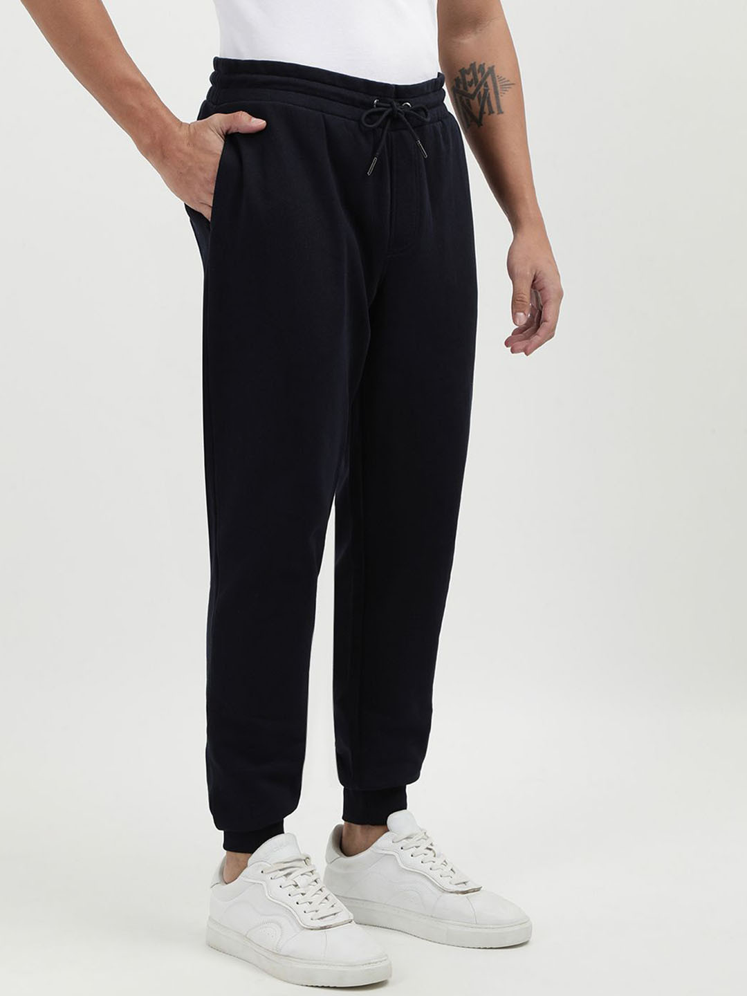 

Tommy Hilfiger Men Solid Pure Cotton Joggers, Black
