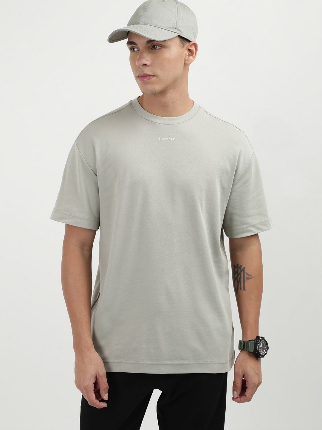 

Calvin Klein Jeans Men Solid Round Neck Cotton T-shirt, Beige