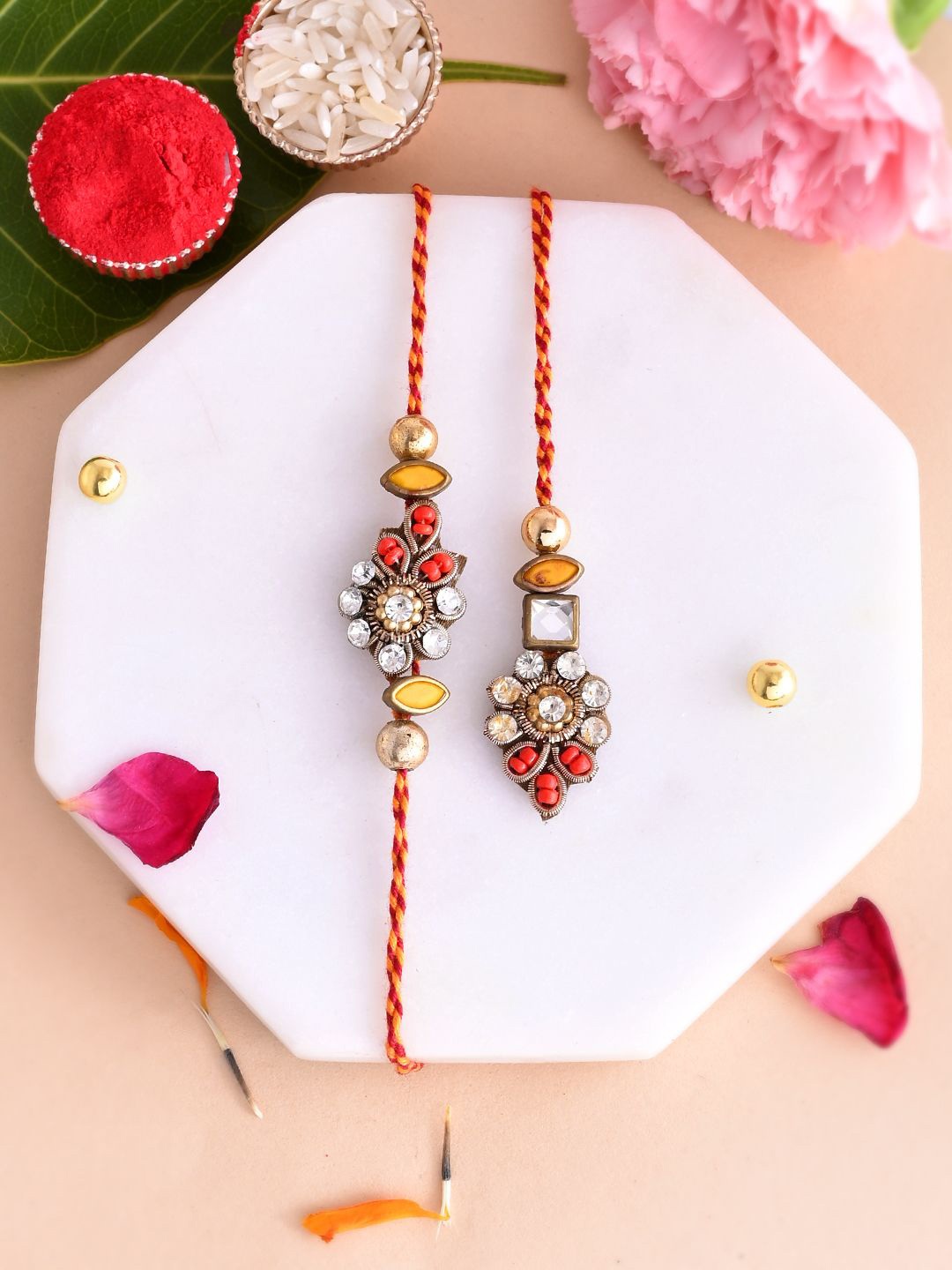 

Anouk Bhaiya Bhabhi Kundan Studded Floral Thread Rakhi With Roli Chawal & Greetings Card, White