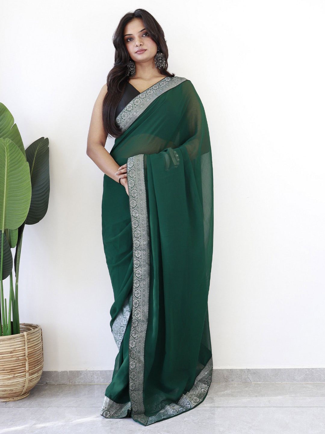

Reeta Fashion Pure Georgette Solid Zari Woven Design Festive Saree, Green