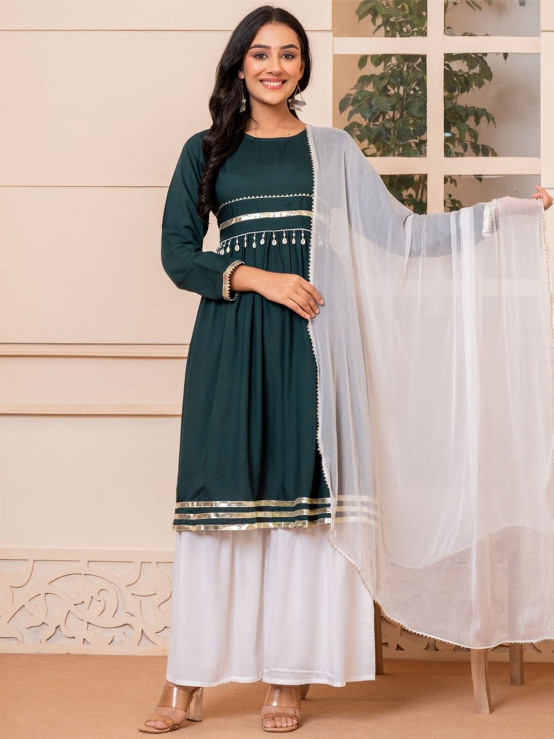 

SHOOLIN Women Pleated Beads and Stones Kurta with Sharara & With Dupatta, Teal