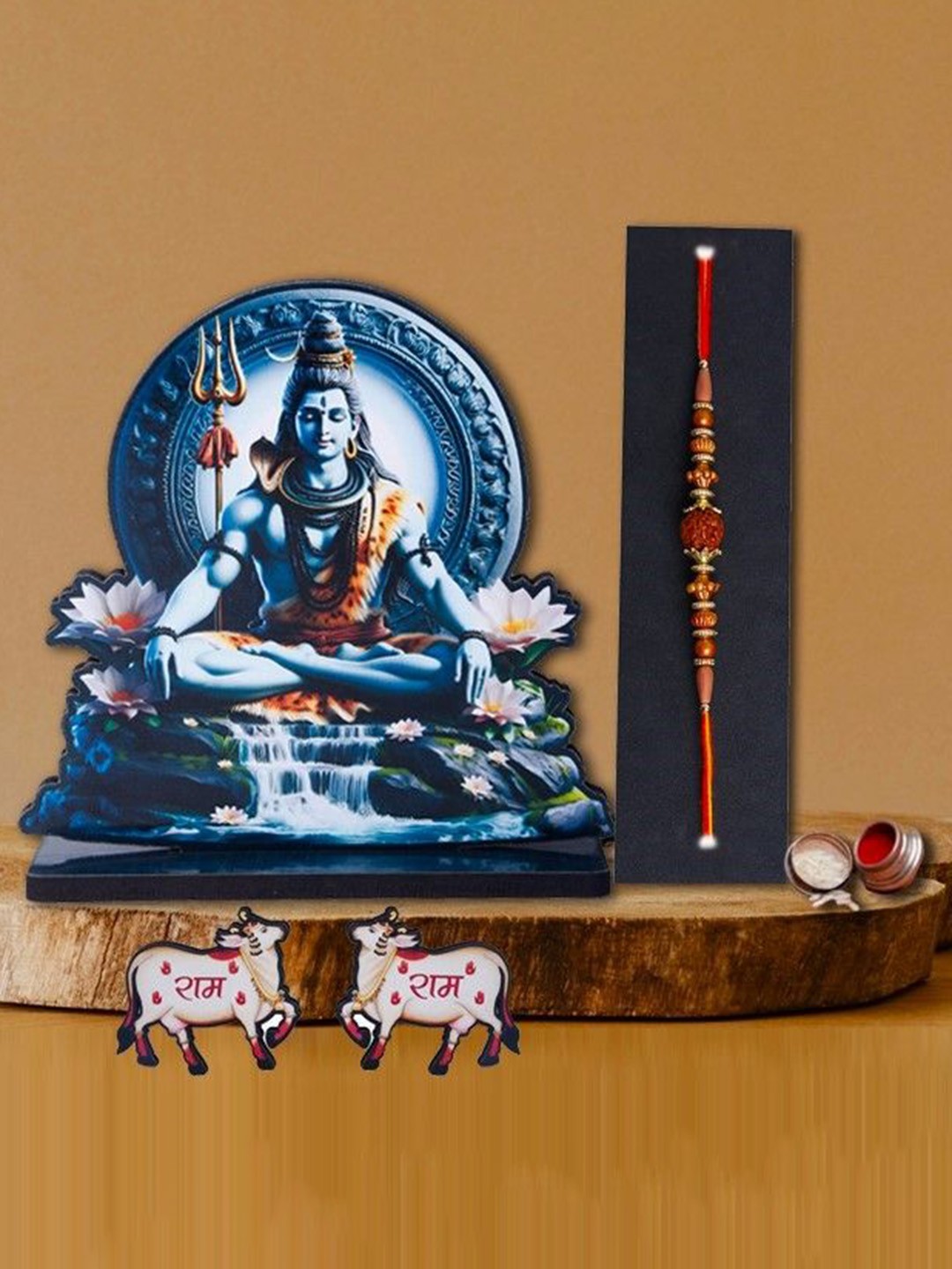 

Phirki Studio Set of 2 Stone Studded Rakhi With God Figure Table stand & Roli Chawal, Gold