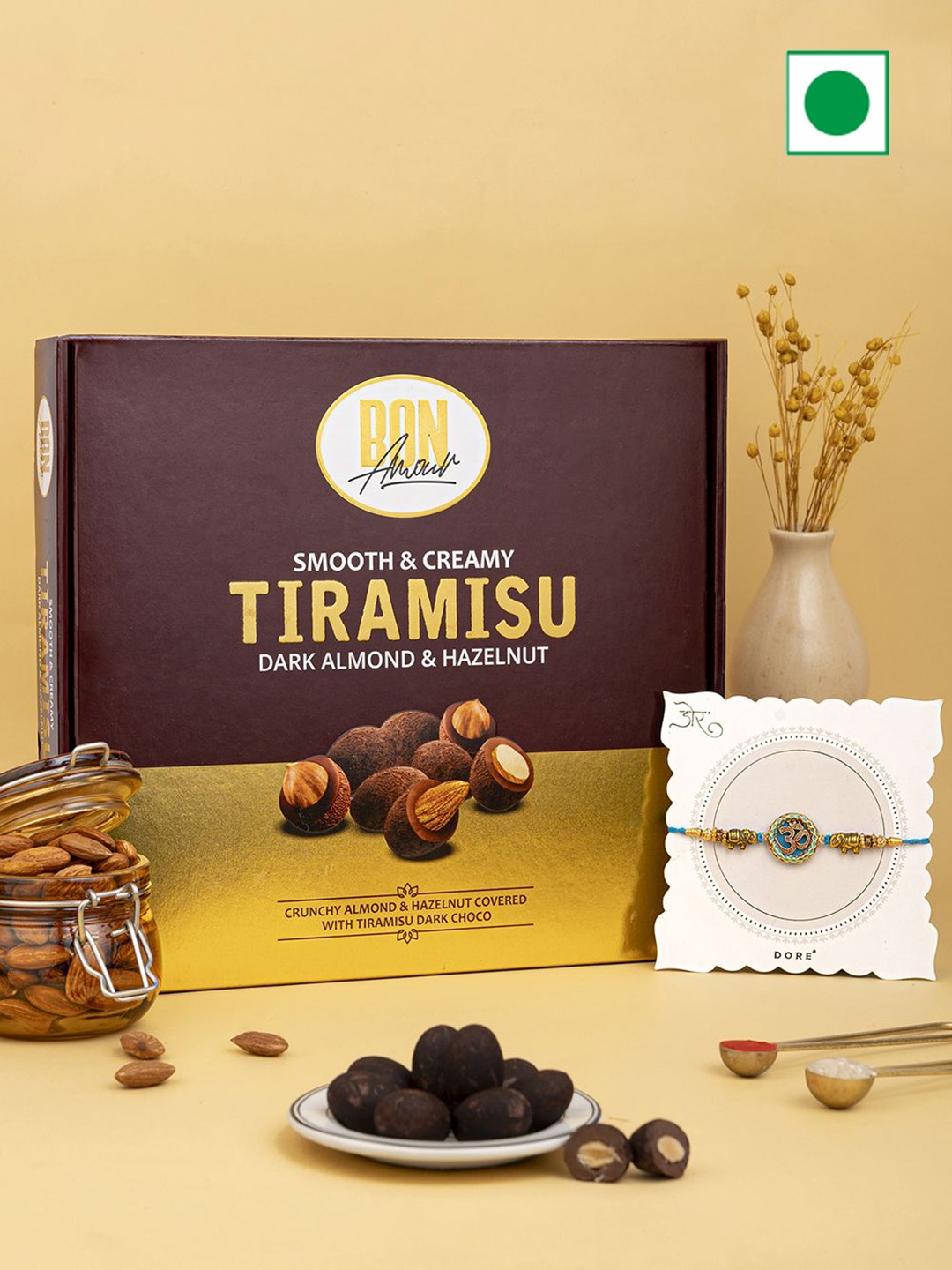 

Hyperfoods OM Thread Rakhi With Tiramisu Dark Hazelnut Chocolates, Brown