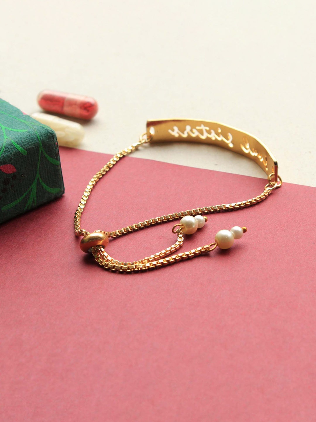 

BeAbhika Bhabhi Lumba Soul Sister Bracelet Rakhi With Roli & Chawal Capsules, Gold